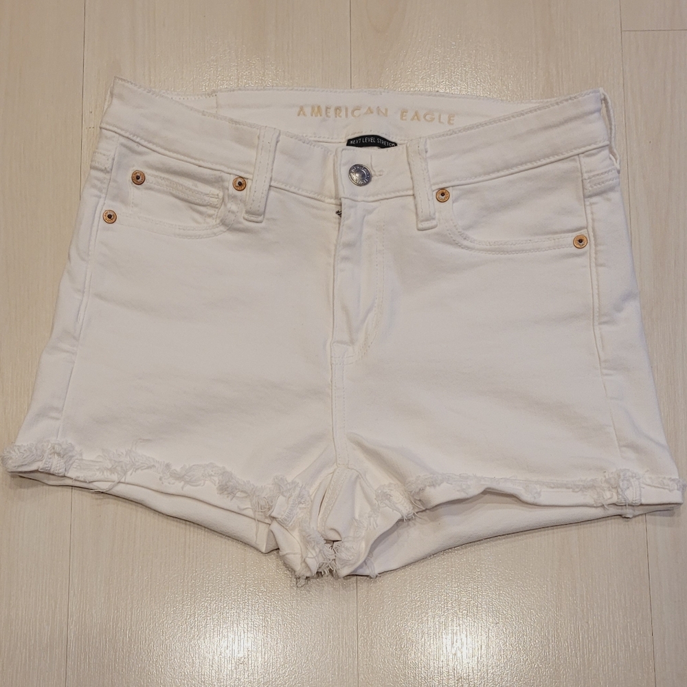 American Eagle AEO Next Level Distressed High Waisted Stretchy White Jean Shorts